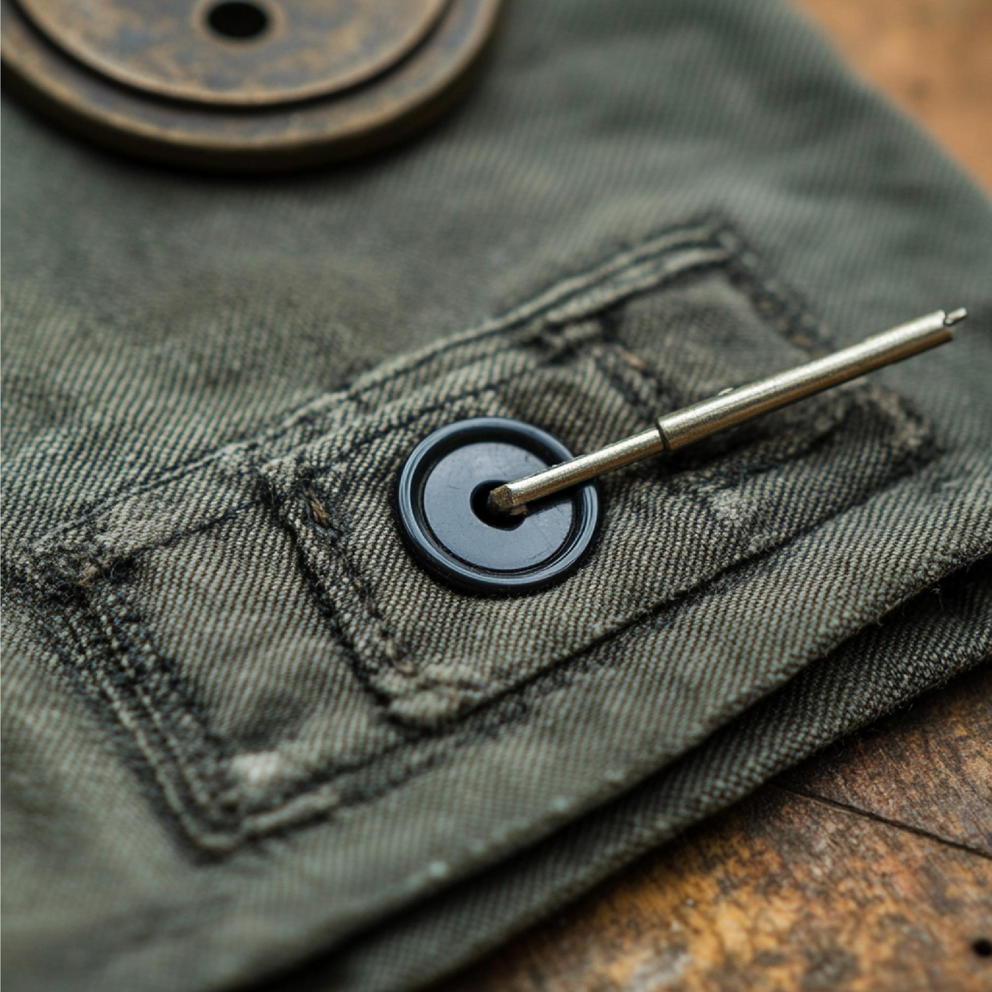 embroidered badge on denim jacket cuff